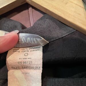 Women’s business jacket with matching mini skirt